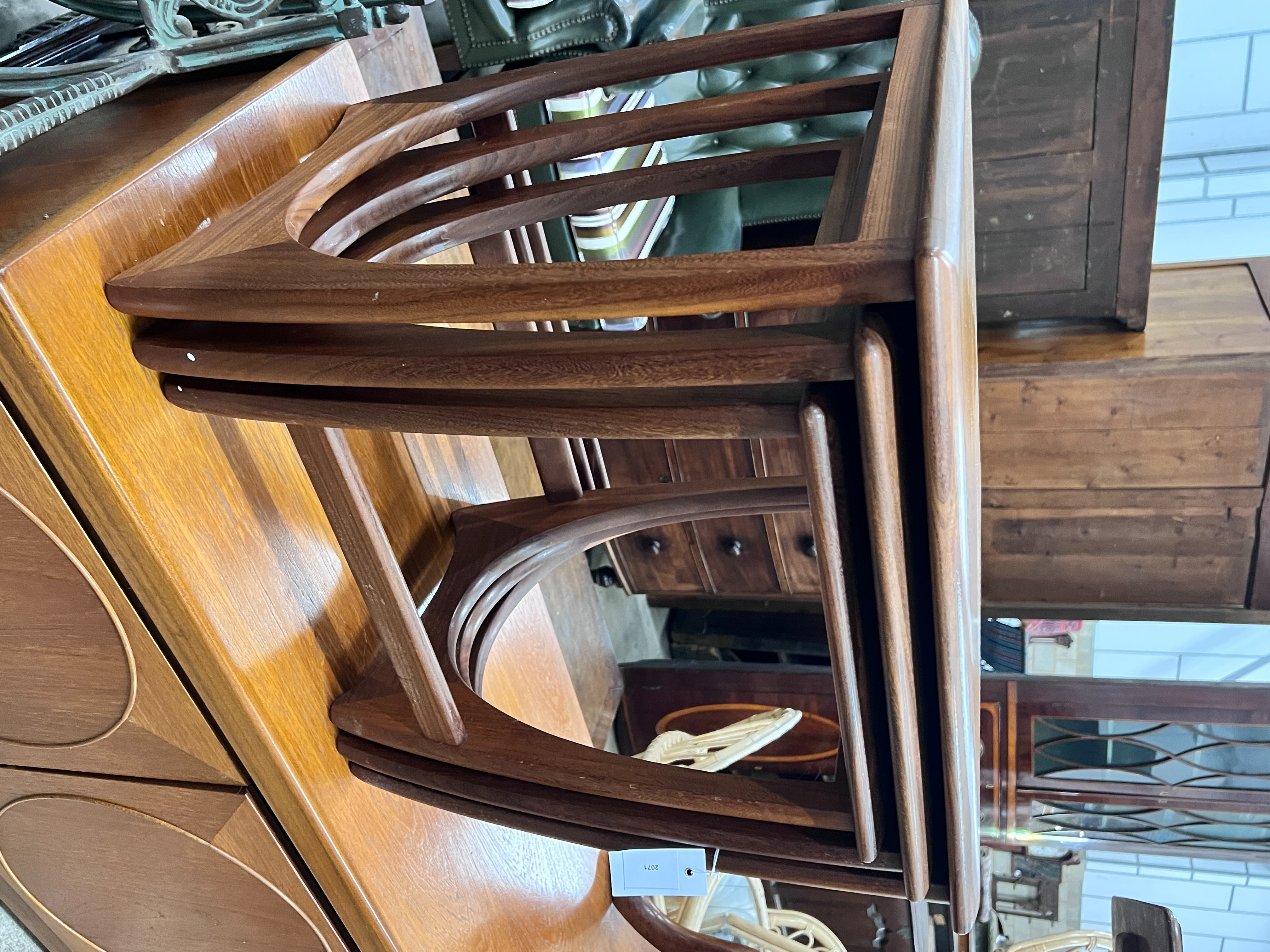 A nest of three G Plan square teak tea tables, 49cm, height 51cm
